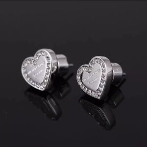 Silver engraved MK heart earrings